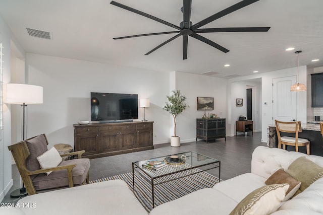 living room featuring ceiling fan