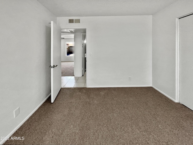 2127 W Marco Polo Rd, Phoenix, AZ 85027 - unfurnished room featuring carpet, tile patterned flooring, and baseboards