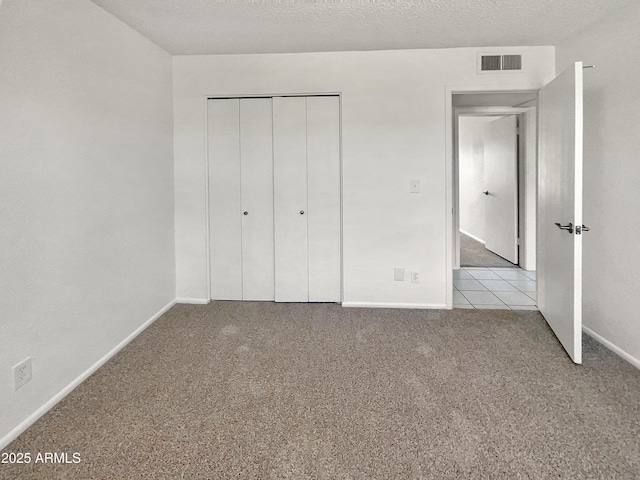 2127 W Marco Polo Rd, Phoenix, AZ 85027 - unfurnished bedroom with carpet flooring, baseboards, and a closet