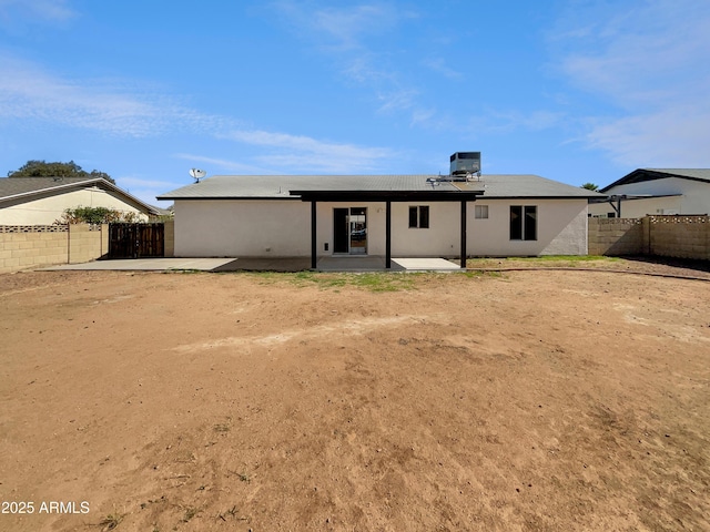 2127 W Marco Polo Rd, Phoenix, AZ 85027 - back of property with a patio, a fenced backyard, and central AC
