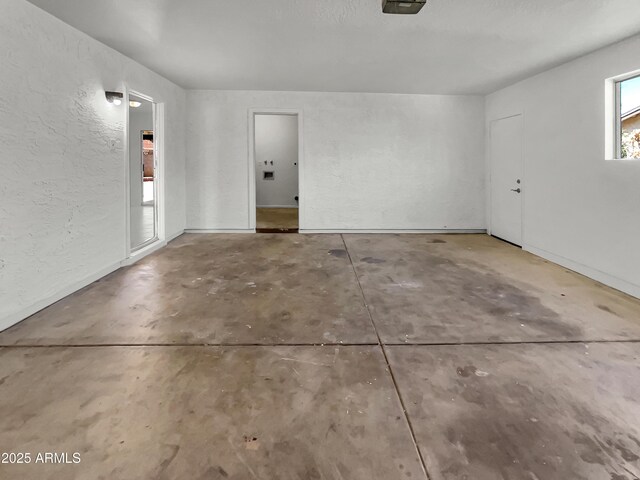 2127 W Marco Polo Rd, Phoenix, AZ 85027 - garage featuring a textured wall