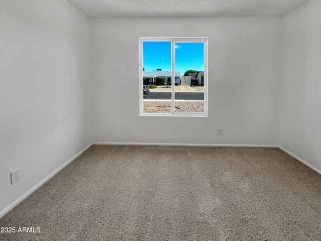2127 W Marco Polo Rd, Phoenix, AZ 85027 - carpeted spare room with baseboards
