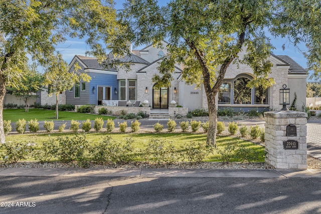 view of front of home with a front yard