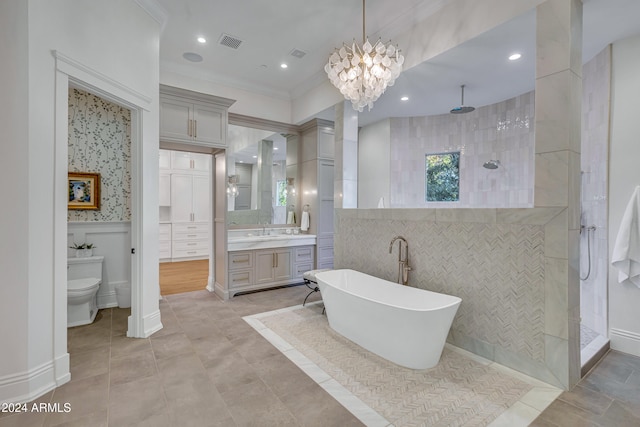 full bathroom featuring toilet, a chandelier, plus walk in shower, and vanity