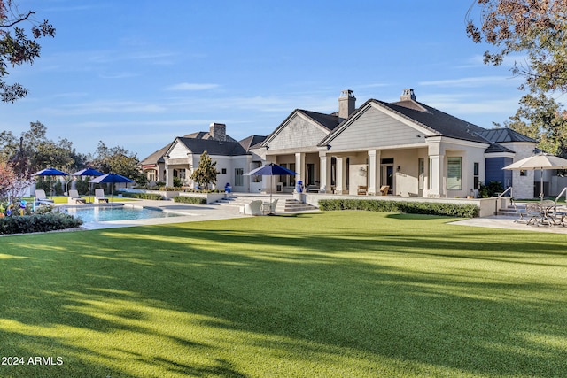 exterior space featuring a patio and a lawn