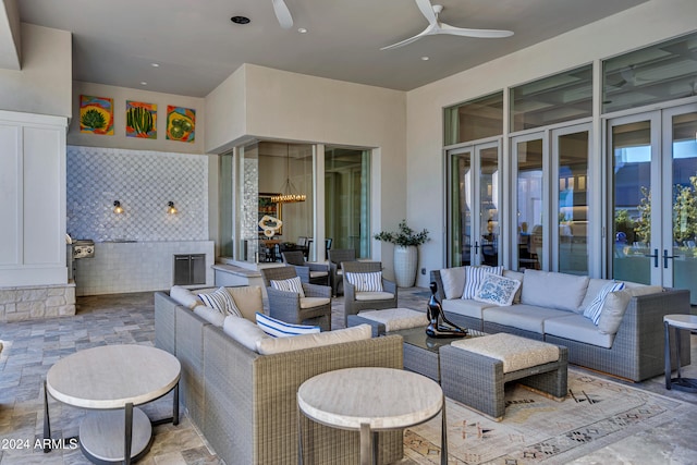 view of patio featuring ceiling fan and outdoor lounge area