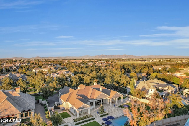 birds eye view of property featuring a mountain view