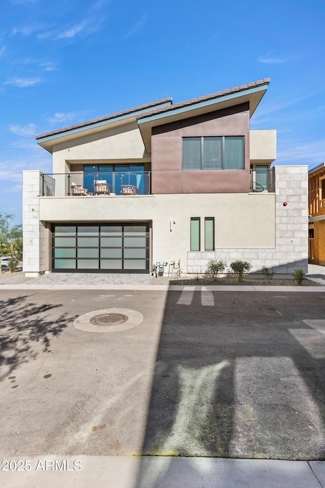 contemporary home with a balcony