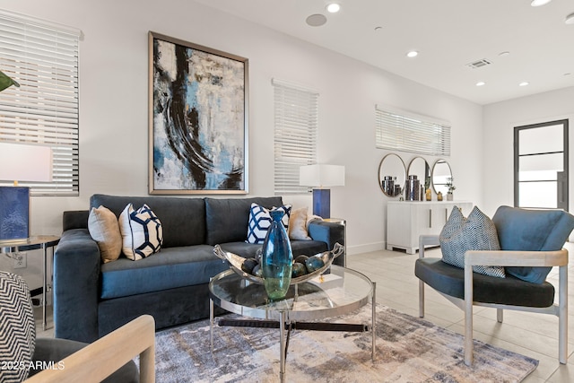 living room with light tile patterned floors