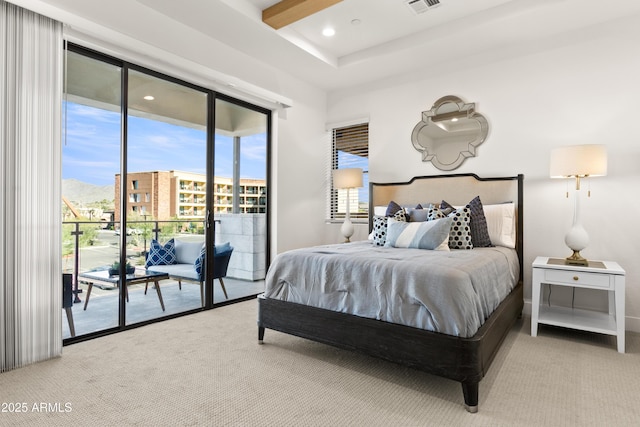 carpeted bedroom featuring beamed ceiling and access to exterior