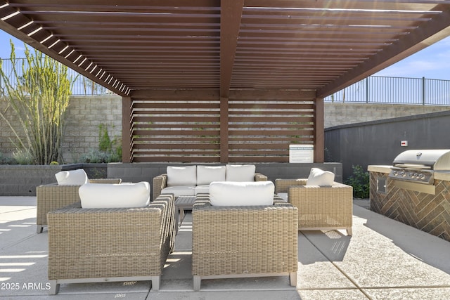 view of patio featuring grilling area, an outdoor hangout area, and a pergola