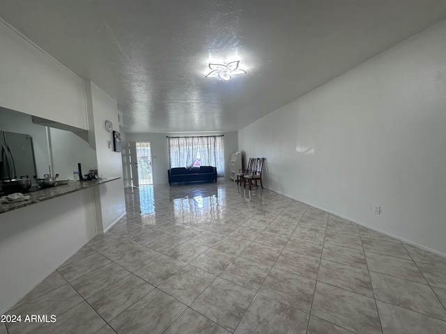4232 W Citrus Way, Phoenix, AZ 85019 - living room featuring a textured ceiling