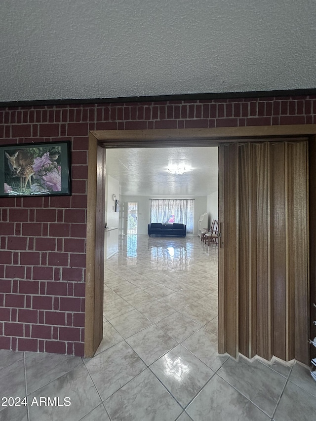 4232 W Citrus Way, Phoenix, AZ 85019 - hallway with light tile patterned flooring