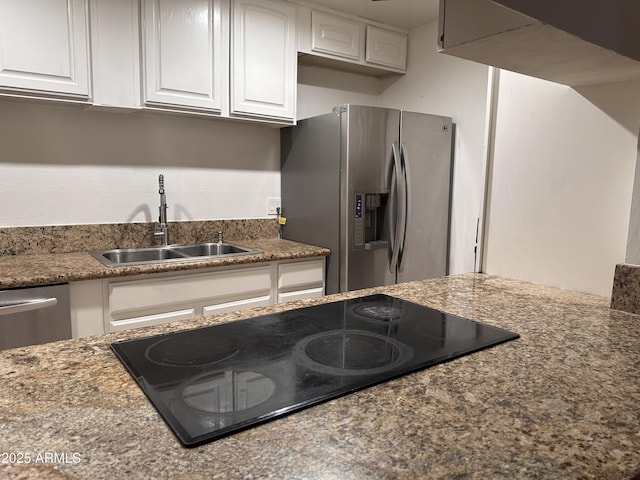 4232 W Citrus Way, Phoenix, AZ 85019 - kitchen featuring stainless steel appliances, a sink, and white cabinetry