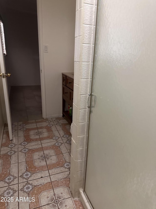 4232 W Citrus Way, Phoenix, AZ 85019 - bathroom with a shower stall, tile patterned floors, and vanity