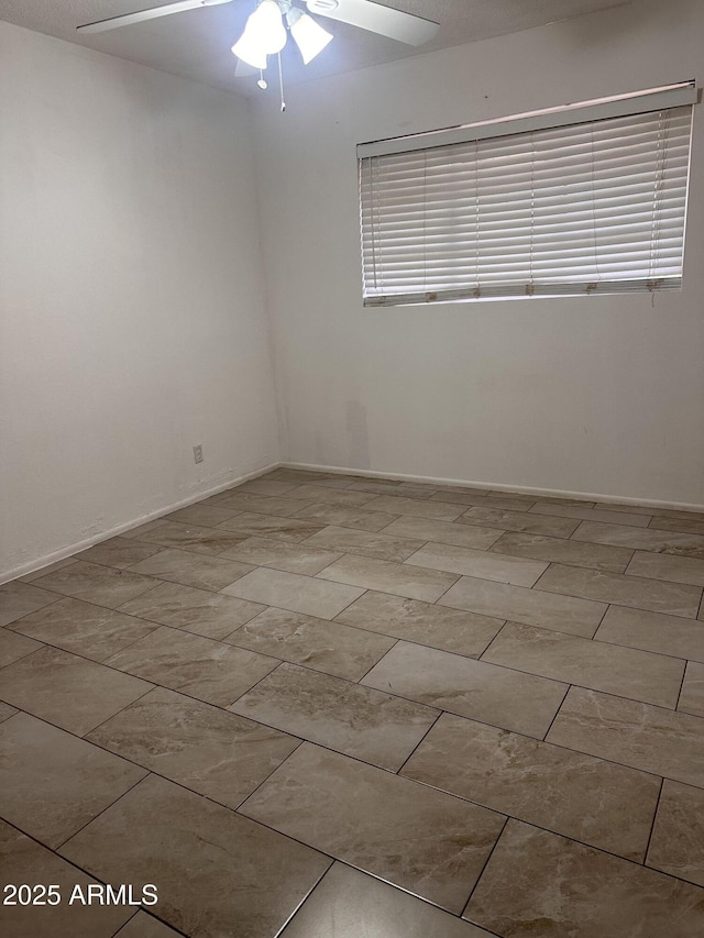 4232 W Citrus Way, Phoenix, AZ 85019 - empty room with ceiling fan and baseboards