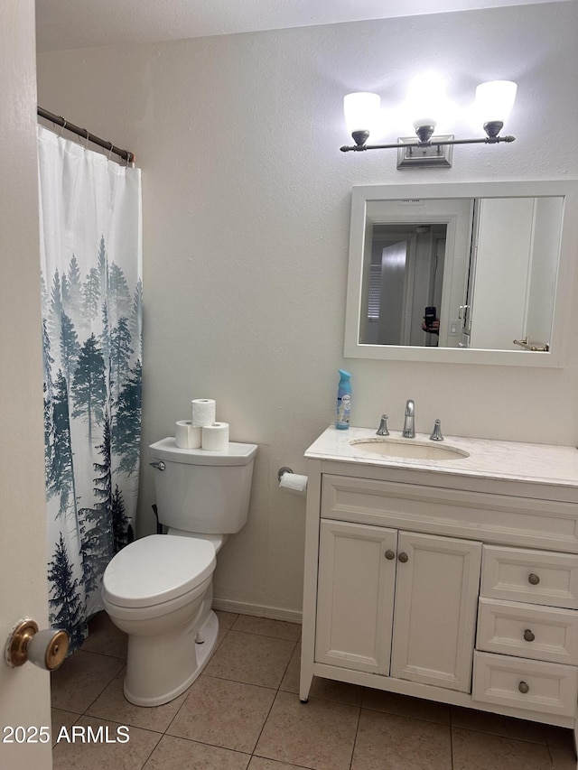 4232 W Citrus Way, Phoenix, AZ 85019 - full bath with vanity, toilet, tile patterned floors, and a shower with curtain