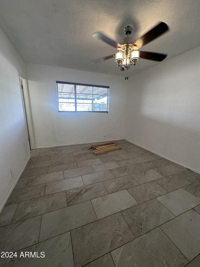 4232 W Citrus Way, Phoenix, AZ 85019 - empty room with a ceiling fan and a textured ceiling