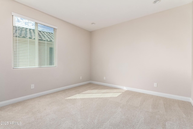 spare room featuring carpet flooring