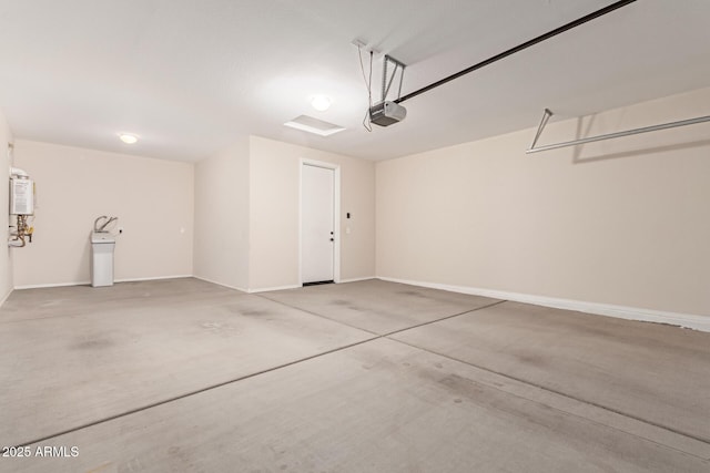 garage featuring a garage door opener and water heater