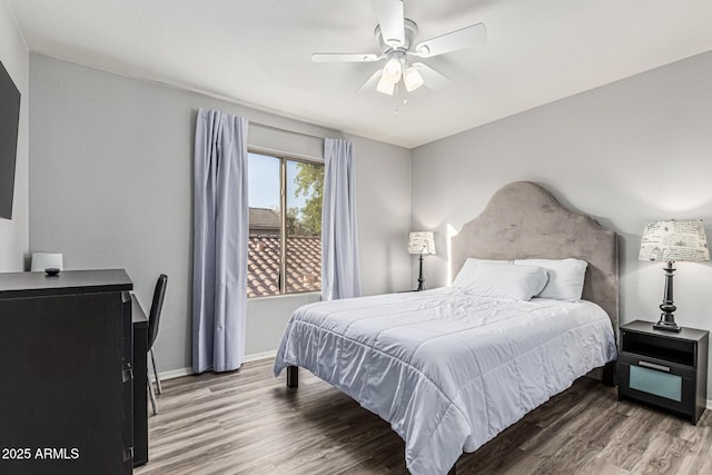 6846 S 26th Pl, Phoenix, AZ 85042 - bedroom featuring wood finished floors and a ceiling fan