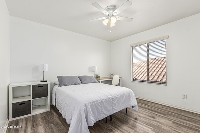 6846 S 26th Pl, Phoenix, AZ 85042 - bedroom with wood finished floors and a ceiling fan