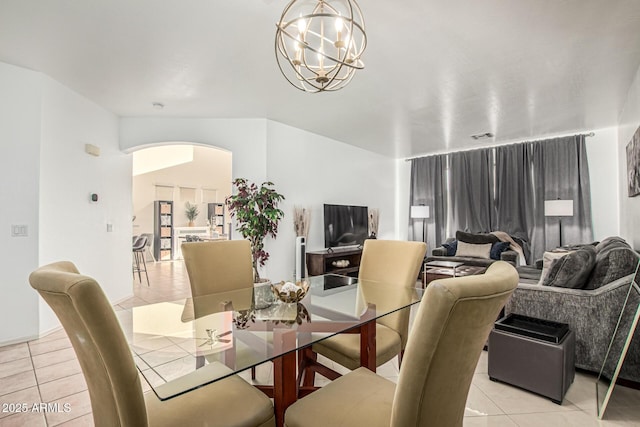 6846 S 26th Pl, Phoenix, AZ 85042 - dining space featuring light tile patterned floors and arched walkways