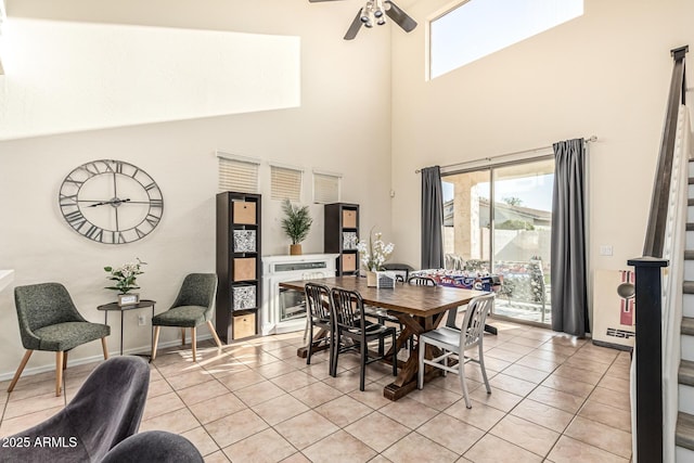 6846 S 26th Pl, Phoenix, AZ 85042 - dining area with ceiling fan, plenty of natural light, a high ceiling, and light tile patterned floors