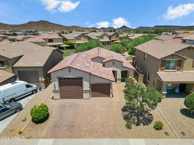 aerial view featuring a mountain view