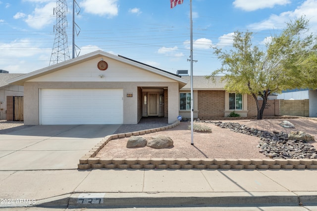 ranch-style home with a garage