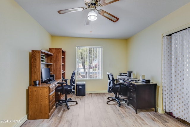 office featuring ceiling fan and light hardwood / wood-style flooring