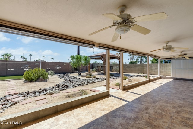 view of patio with ceiling fan