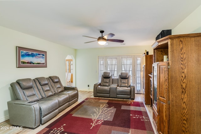 living room with ceiling fan, french doors, and hardwood / wood-style flooring