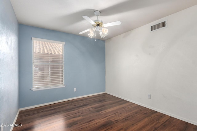 2615 N 123rd Dr, Avondale, AZ 85392 - empty room with wood finished floors, ceiling fan, and baseboards