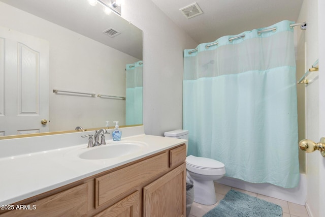 2615 N 123rd Dr, Avondale, AZ 85392 - bathroom with vanity, tile patterned floors, toilet, and shower / bath combo