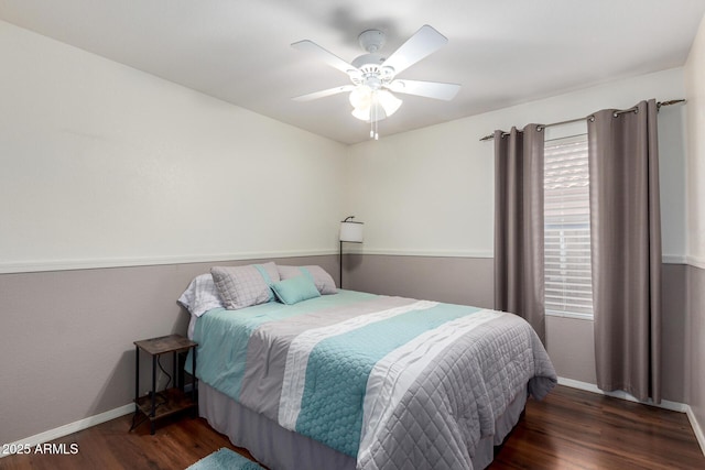 2615 N 123rd Dr, Avondale, AZ 85392 - bedroom featuring wood finished floors, baseboards, multiple windows, and a ceiling fan
