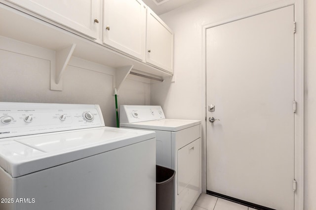 2615 N 123rd Dr, Avondale, AZ 85392 - laundry room with washing machine and dryer, cabinet space, and light tile patterned flooring