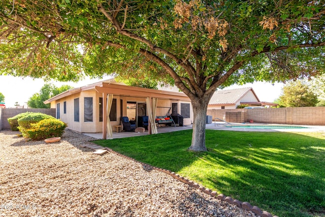 2615 N 123rd Dr, Avondale, AZ 85392 - back of property featuring a patio and stucco siding