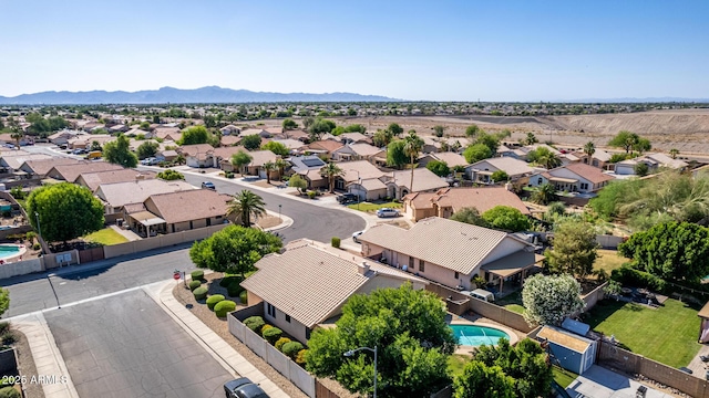 2615 N 123rd Dr, Avondale, AZ 85392 - aerial view of residential area featuring a pool and a mountainous background