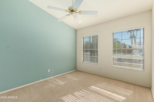 14766 W Piccadilly Rd, Goodyear, AZ 85395 - carpeted spare room with baseboards, a ceiling fan, and lofted ceiling