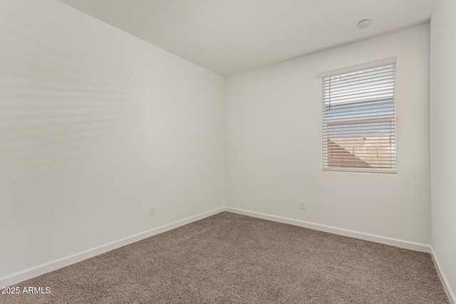 unfurnished room with carpet flooring