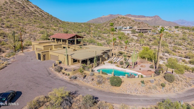 8752 E Range Rider Trl, Mesa, AZ 85207 - view of subject property with mountains and a pool