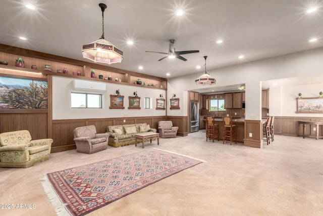 8752 E Range Rider Trl, Mesa, AZ 85207 - living room with a wainscoted wall, ceiling fan, light colored carpet, recessed lighting, and wooden walls
