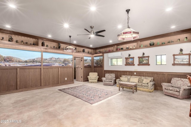 8752 E Range Rider Trl, Mesa, AZ 85207 - living room with recessed lighting, a ceiling fan, an AC wall unit, and wood walls