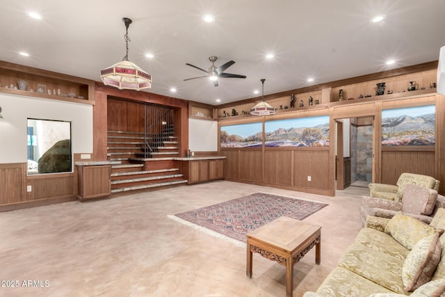 8752 E Range Rider Trl, Mesa, AZ 85207 - living area featuring recessed lighting, ceiling fan, and stairway