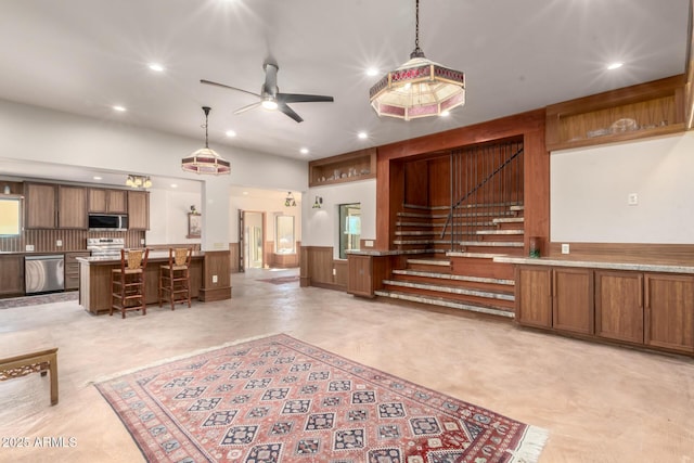 8752 E Range Rider Trl, Mesa, AZ 85207 - living area with stairs, recessed lighting, wainscoting, and a ceiling fan