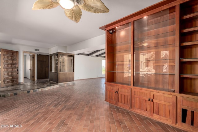 8752 E Range Rider Trl, Mesa, AZ 85207 - unfurnished living room featuring wood finished floors
