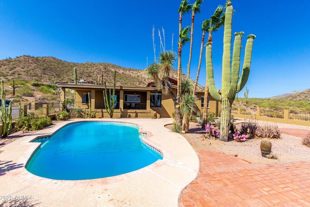 8752 E Range Rider Trl, Mesa, AZ 85207 - view of pool with a mountain view and a patio area