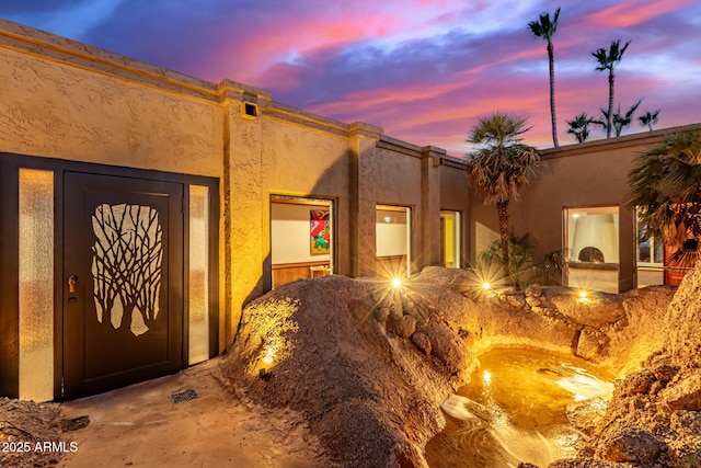 8752 E Range Rider Trl, Mesa, AZ 85207 - view of exterior entry with stucco siding