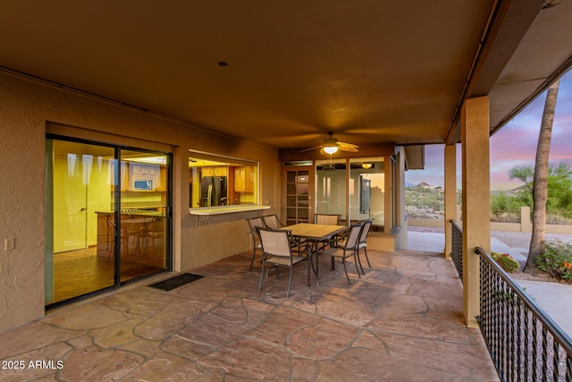 8752 E Range Rider Trl, Mesa, AZ 85207 - view of patio featuring ceiling fan and outdoor dining area